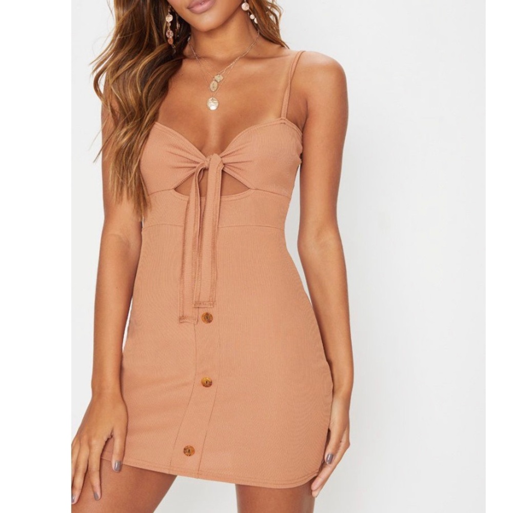 Tie front dress. Never worn was too small for me